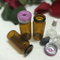 Mini Capacity Glass Vial 1ml Travel Size Amber Roll on Bottle with Plastic Cap for Essential Oil